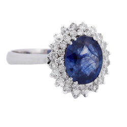 Bague Entourage en or blanc, saphir et diamants