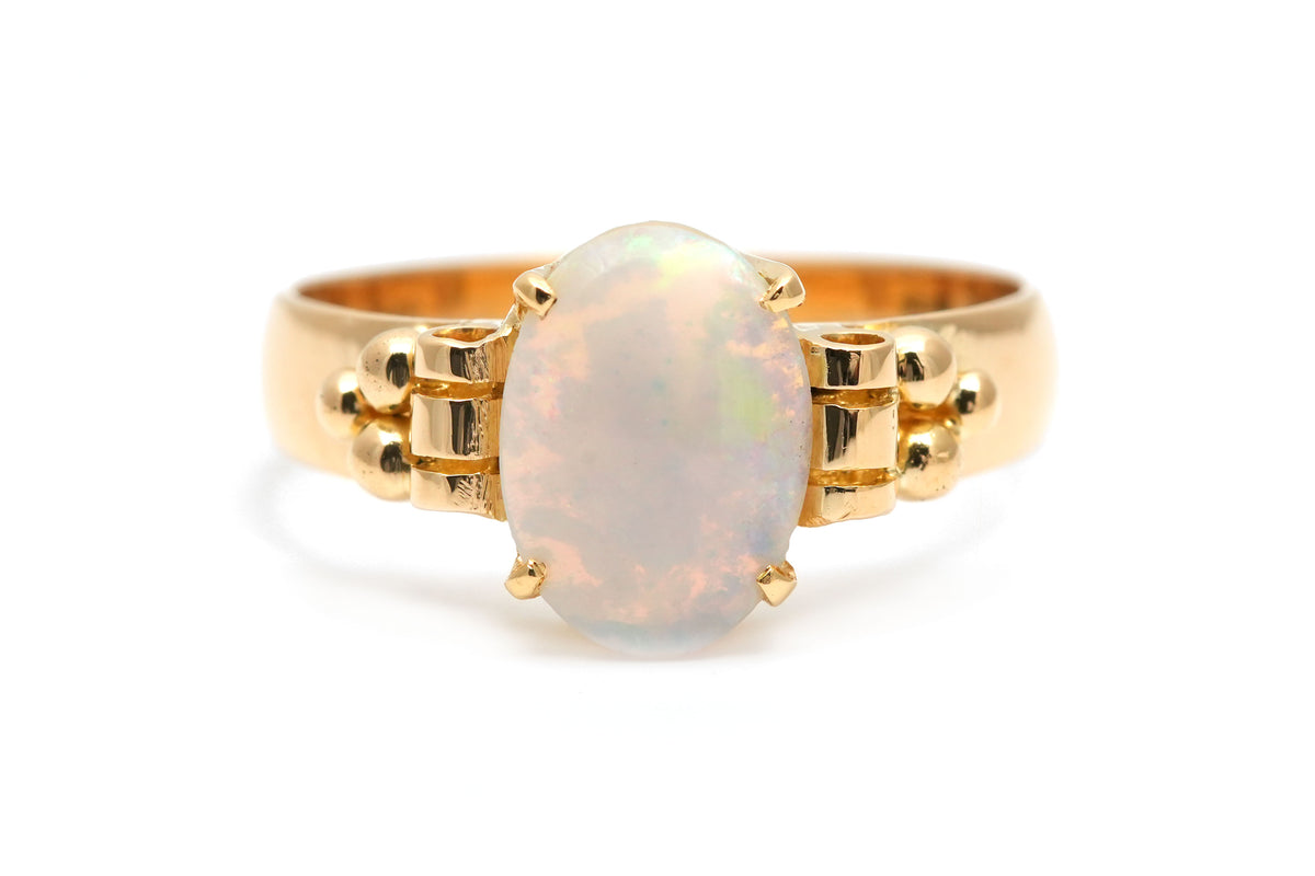 Bague Solitaire en or jaune et opale
