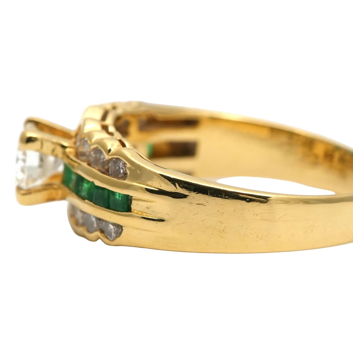 Bague Bandeau en or jaune, émeraudes et diamants