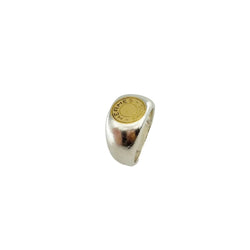 Bague Chevalière HERMÈS "Clou de selle" en argent et or jaune