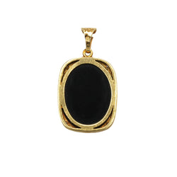Pendentif en or jaune, onyx et diamants