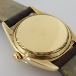 Montre ROLEX "Oyster Perpetual Date Ovettone" en or jaune et cuir