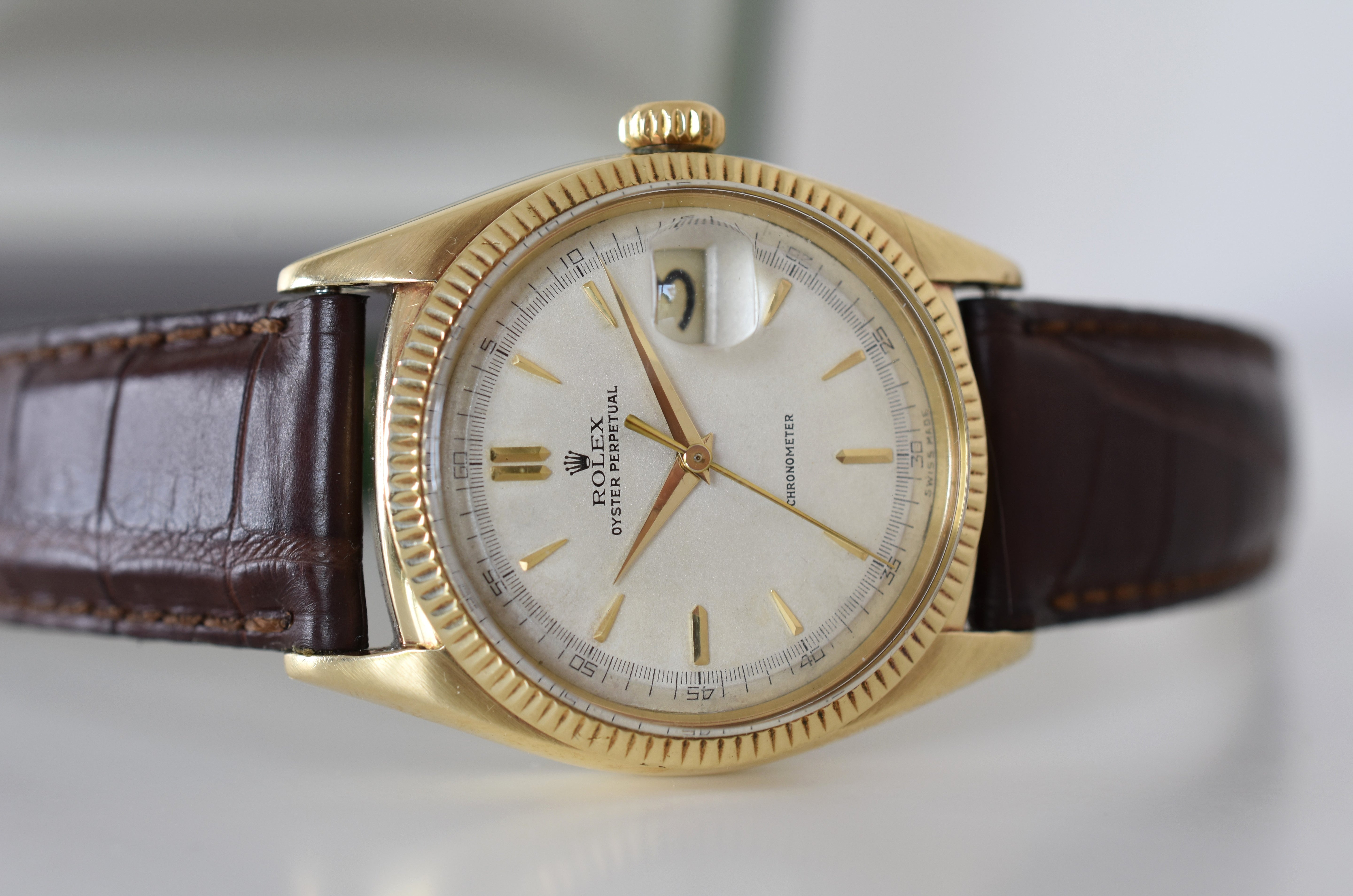 Montre ROLEX "Oyster Perpetual Date Ovettone" en or jaune et cuir