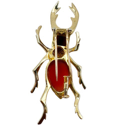 Broche HERMÈS "Scarabée" en or jaune, cornaline et agate