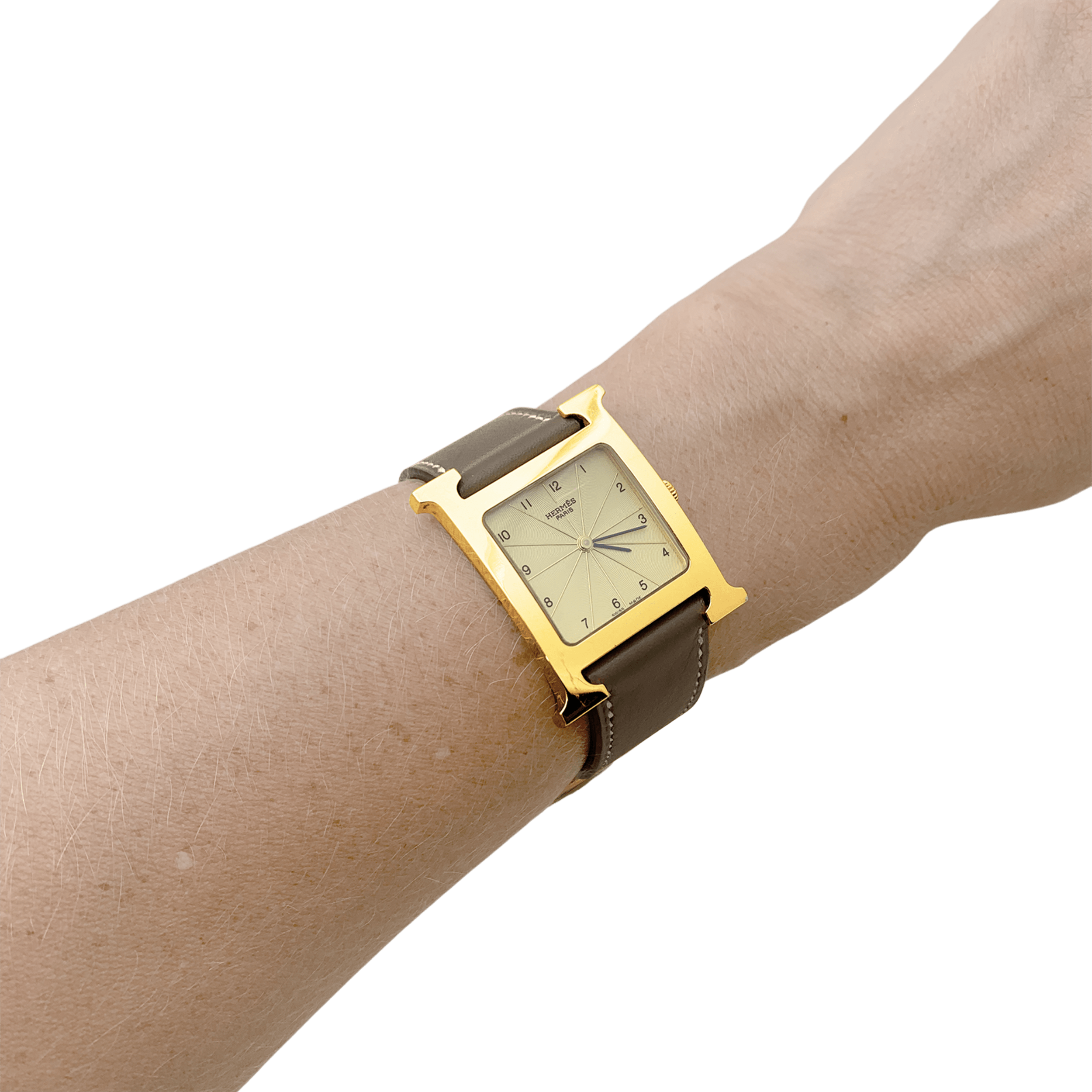 Montre Hermès, "Heure H", plaqué or, acier.