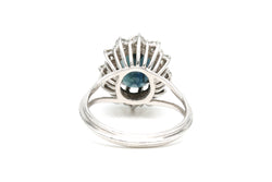 Bague Entourage en or blanc, saphirs et diamants