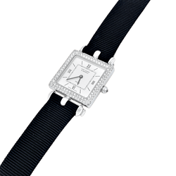 Montre Van Cleef & Arpels, "Classique Arpels" en or blanc, diamants.