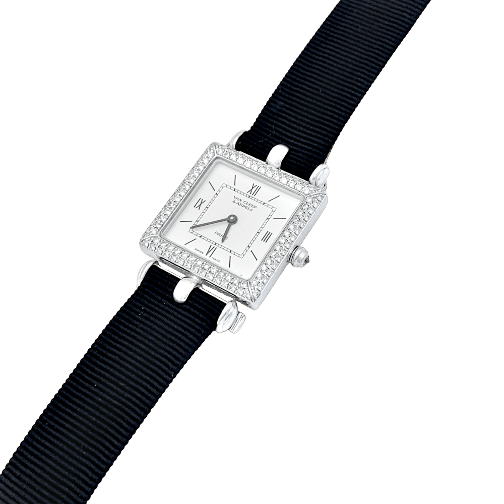 Montre Van Cleef & Arpels, "Classique Arpels" en or blanc, diamants.