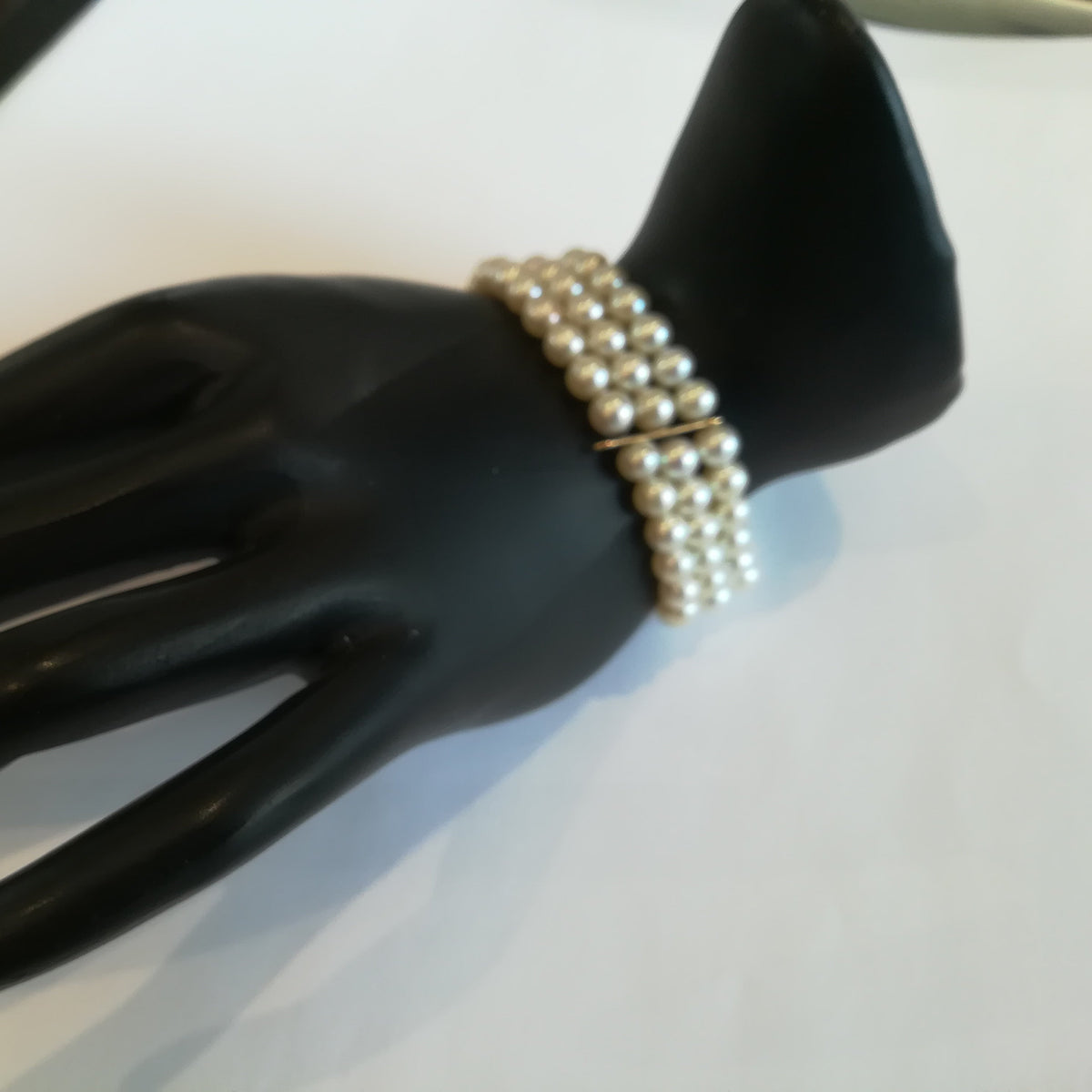 Bracelet en or jaune et perles