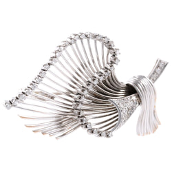 Broche en or blanc et diamants