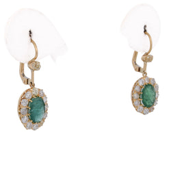 Boucles d'oreilles Pendantes en or jaune, émeraudes et diamants