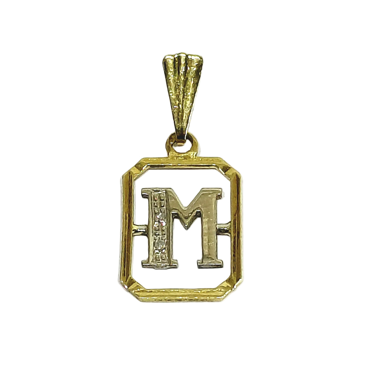 Pendentif “M” en or blanc, or jaune et diamants