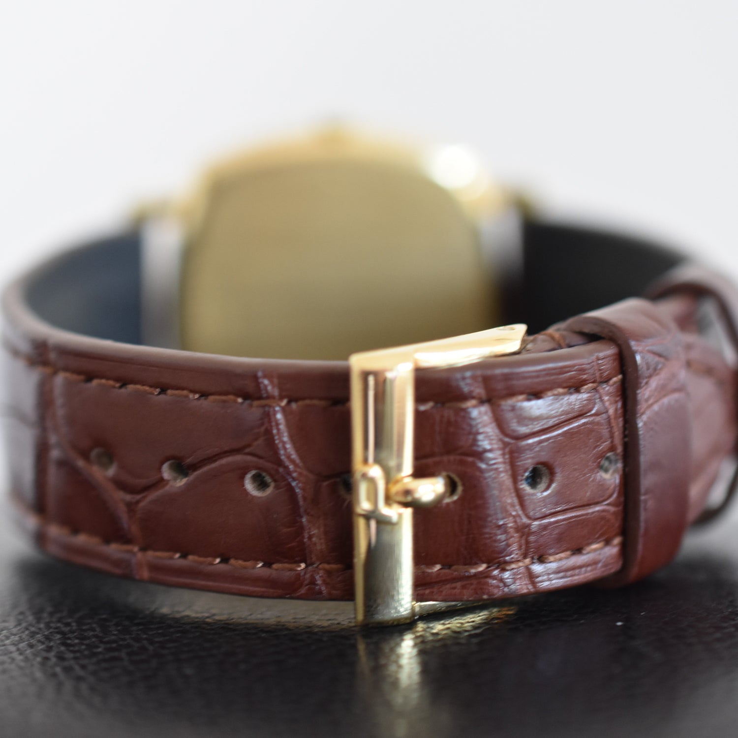 Montre PIAGET Coussin en or jaune et cuir
