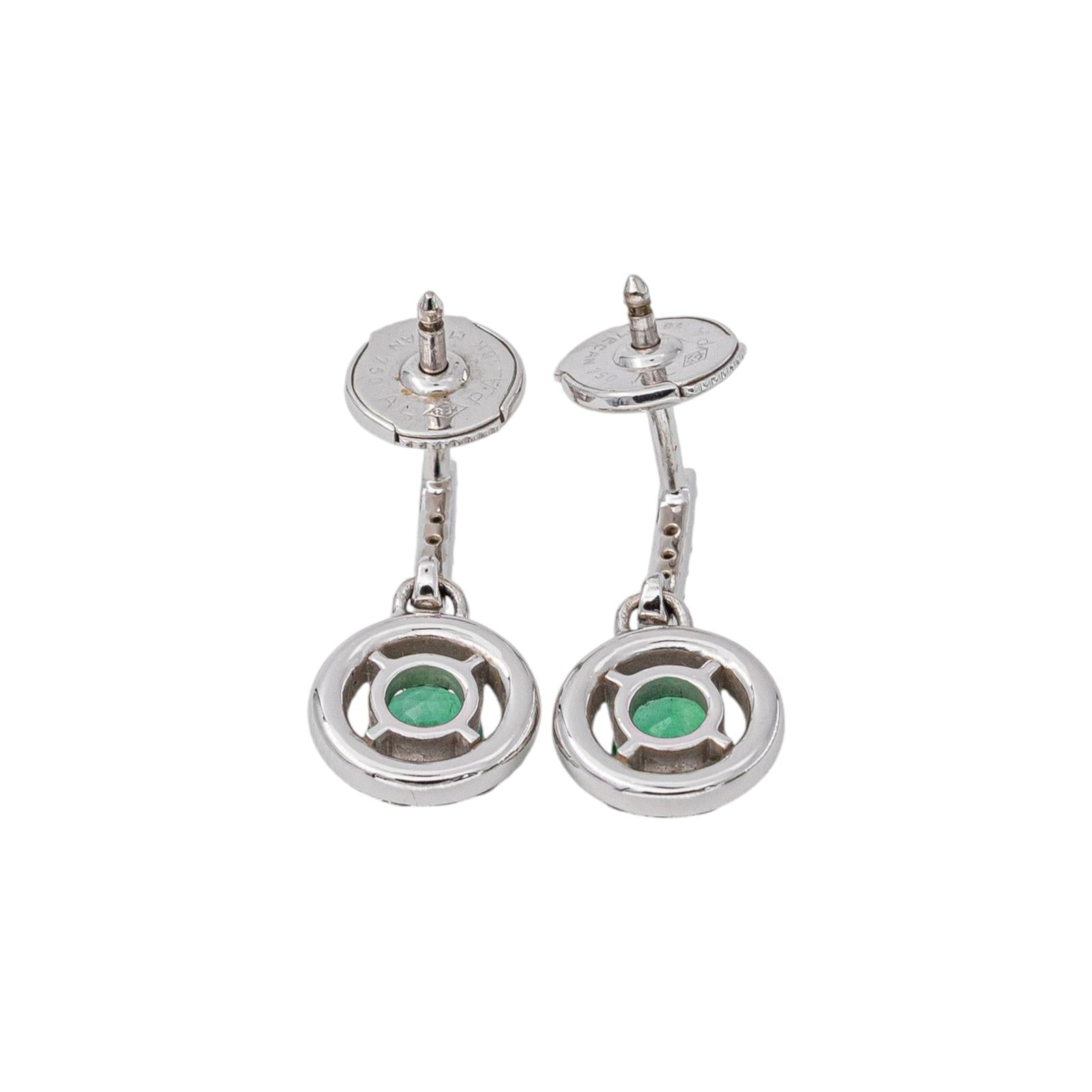 Boucles d'oreilles Pendantes en or blanc, émeraudes et diamants