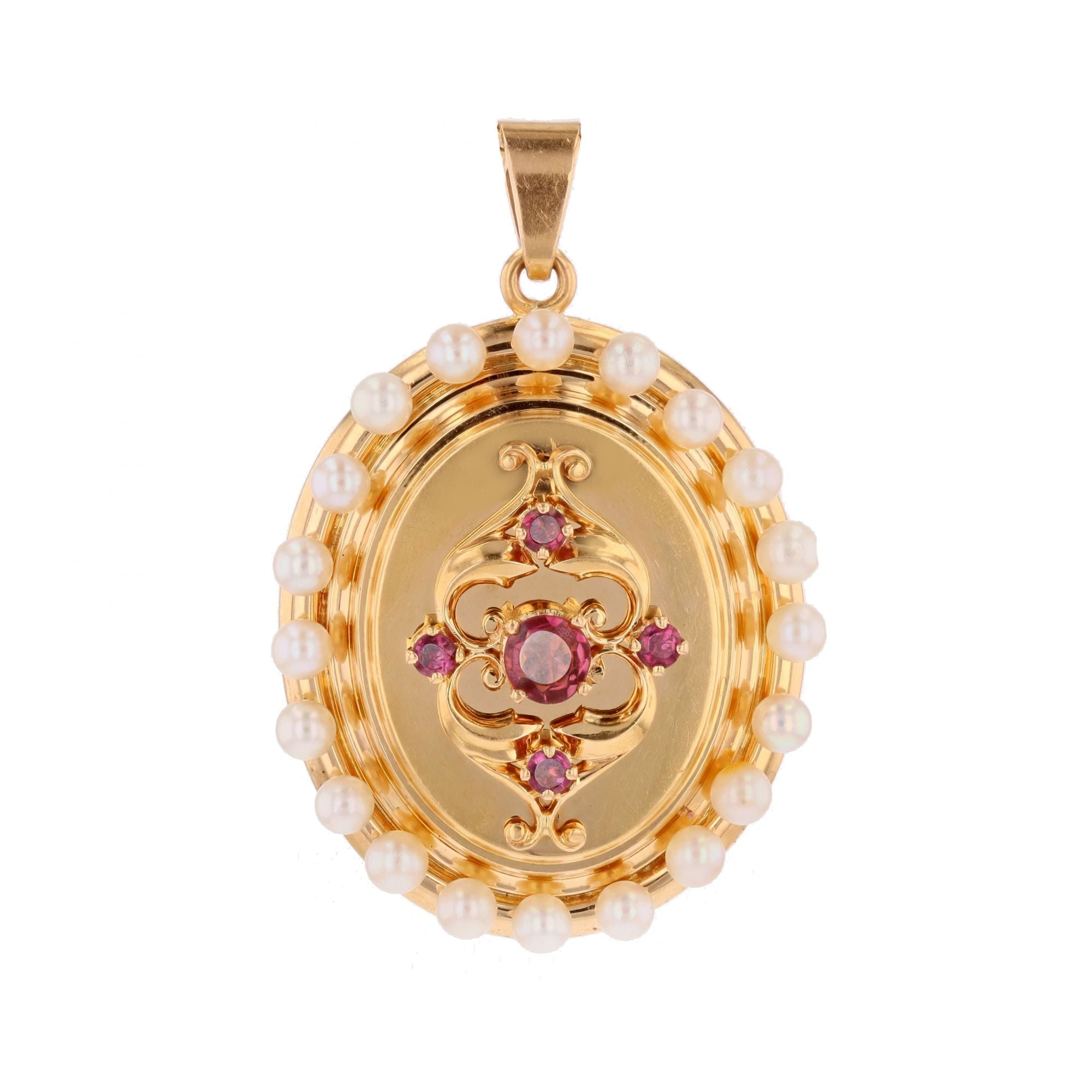 Pendentif en or jaune, perles et grenats
