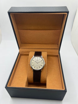 Montre OMEGA "De Ville" en acier et cuir