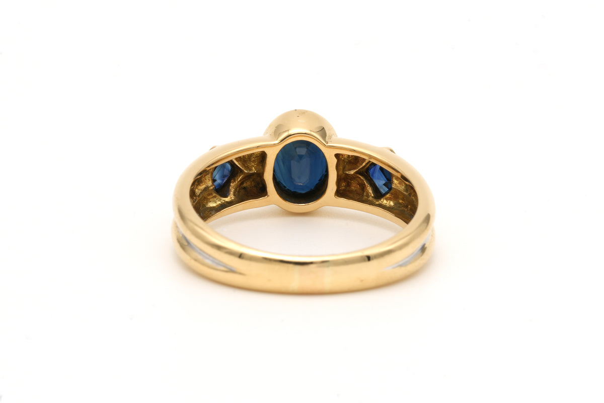 Bague Trilogie en or blanc, or jaune et saphirs