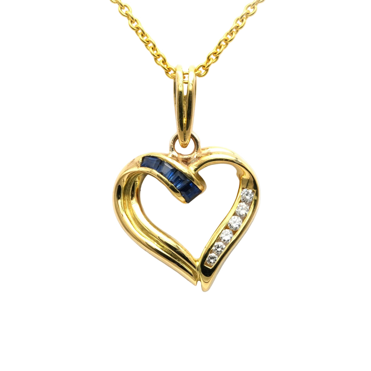 Pendentif en or jaune, saphirs et diamants