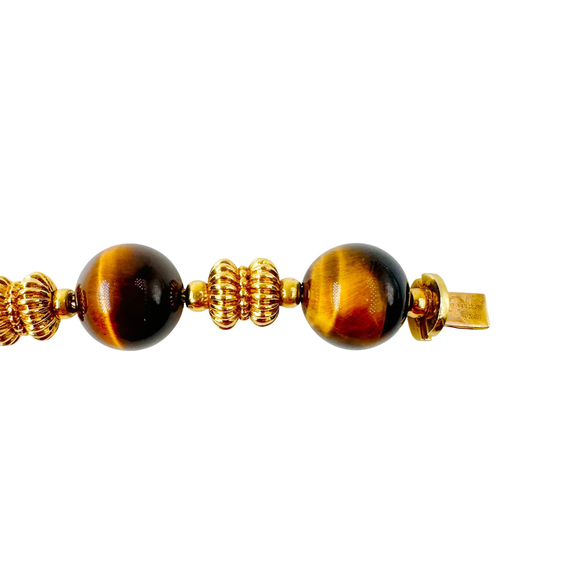 Bracelet O.J. PERRIN en or jaune et perles d'oeil de tigre