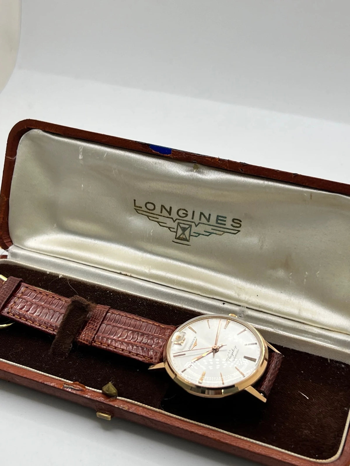 Montre LONGINES "Flagship" en or rose, acier et cuir