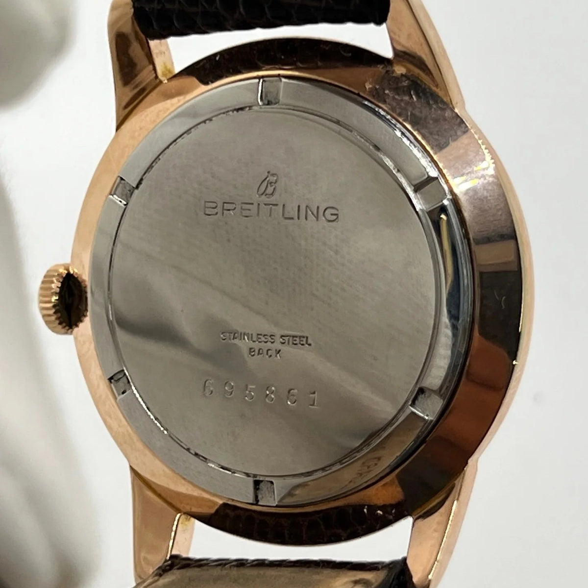 Montre BREITLING "Genève" plaqué or rose, acier et cuir