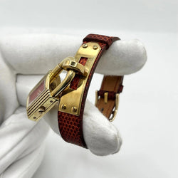 Montre HERMÈS Kelly plaqué or, acier et cuir