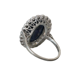 Bague Entourage en or blanc, saphir et diamants