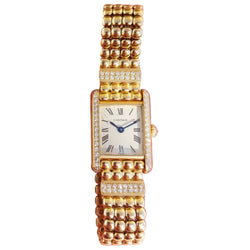 Montre CARTIER "Tank Louis Cartier Mini" en or jaune et diamants