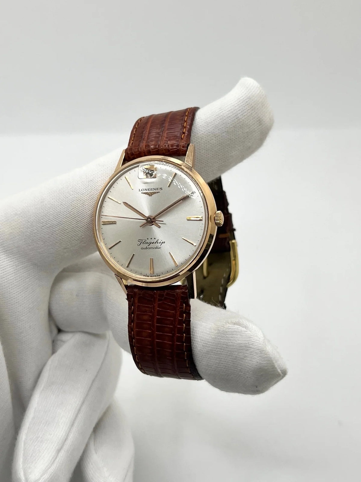 Montre LONGINES "Flagship" en or rose, acier et cuir