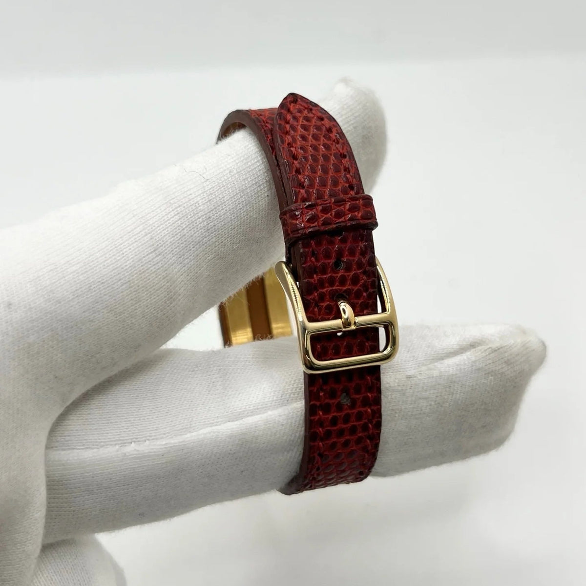 Montre HERMÈS Kelly plaqué or, acier et cuir