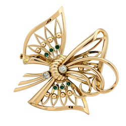 Broche en or jaune, émeraudes et diamants