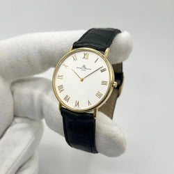 Montre BAUME & MERCIER "Classima" en or jaune, acier et cuir