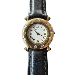 Montre CHOPARD "Classic" en or jaune, cuir, saphir et diamants