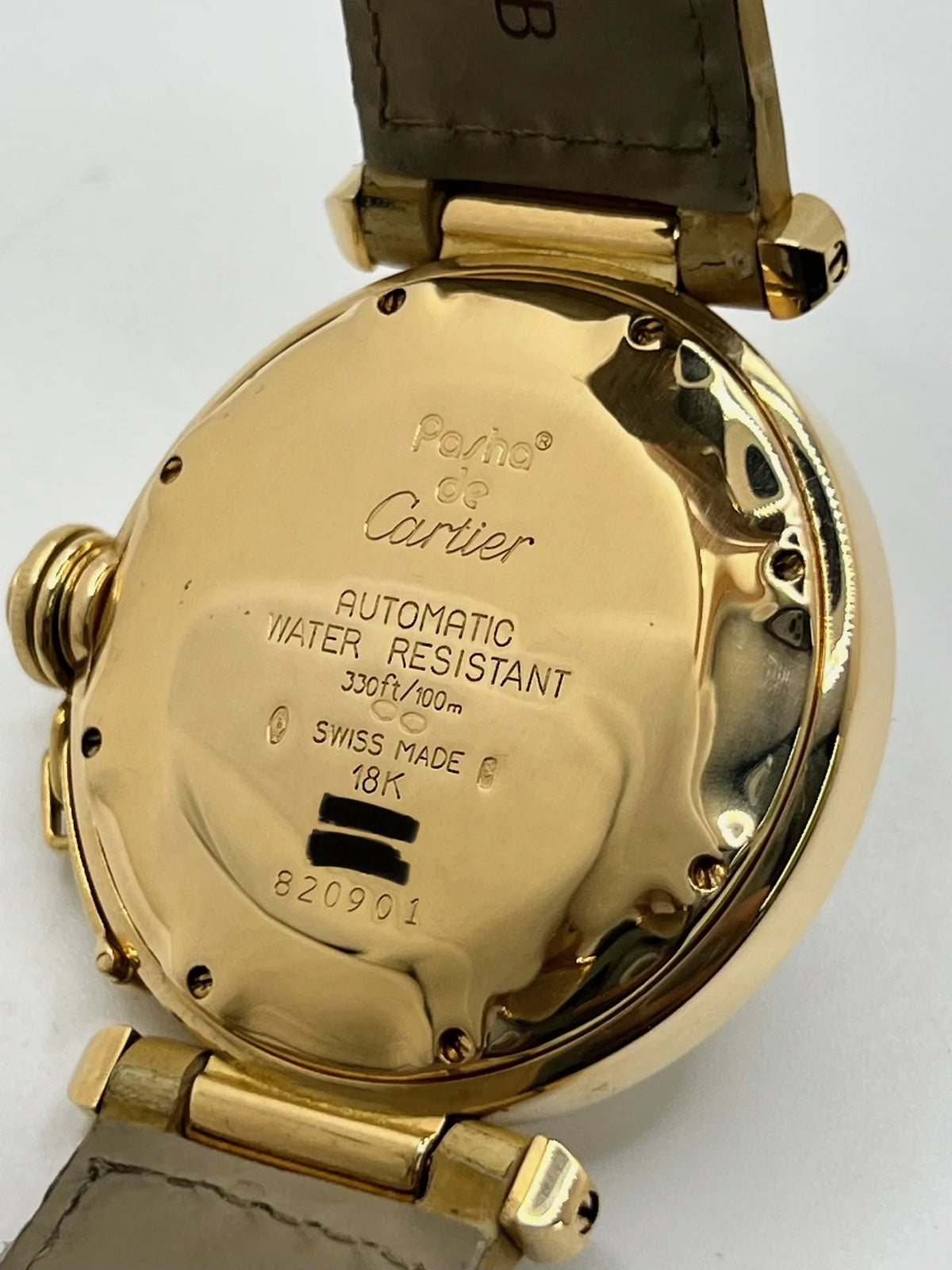 Montre CARTIER "Pasha" en or jaune, or rose, cuir et diamants