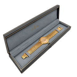 Montre CORUM "Romvlvs" en or jaune