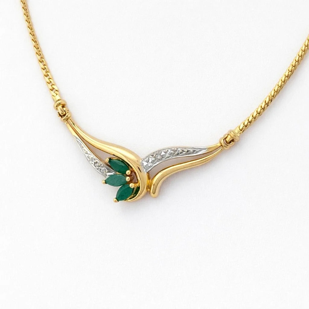 Collier Pendentif en or blanc, or jaune, émeraudes et diamants