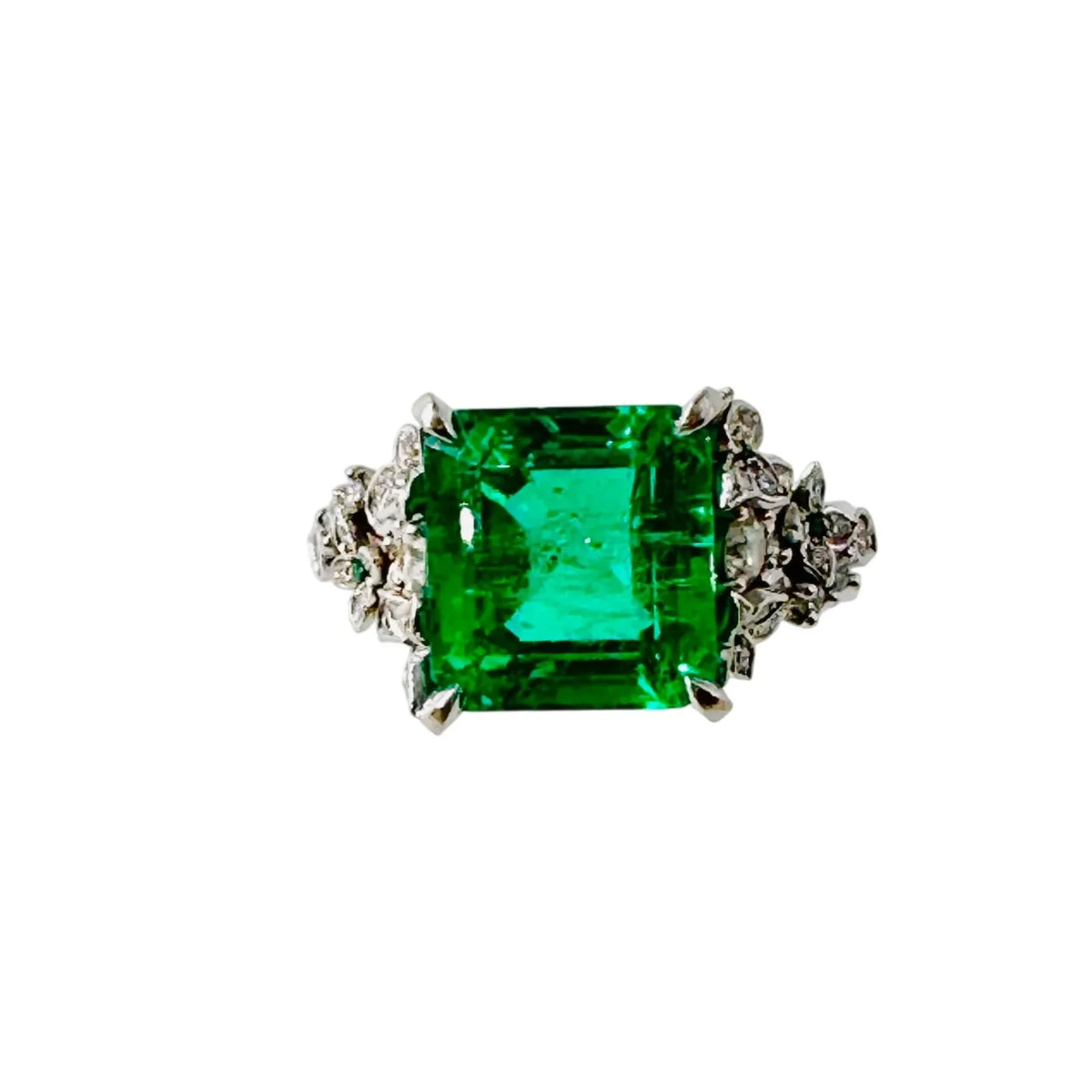 Bague Solitaire en or blanc, émeraude et diamants