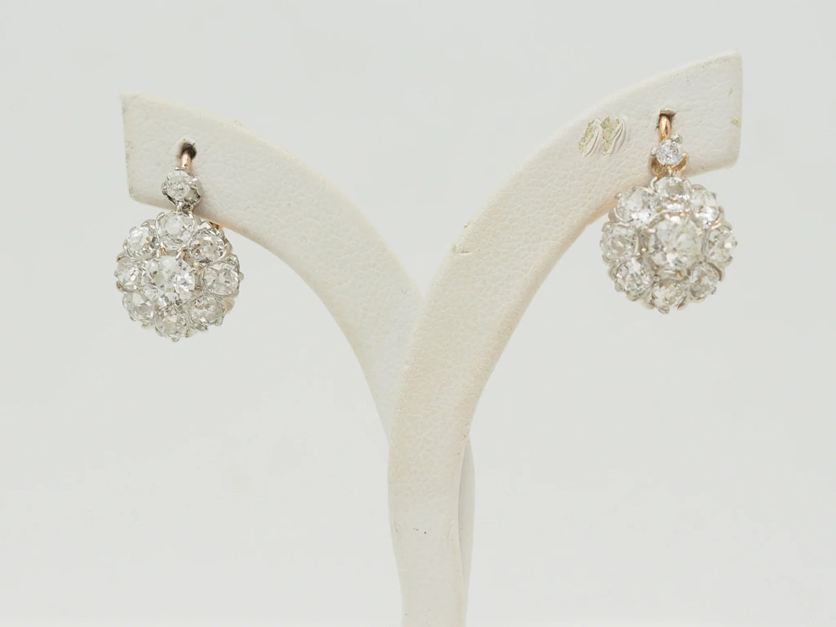 Boucles d'oreilles Dormeuses en or jaune, platine et diamants
