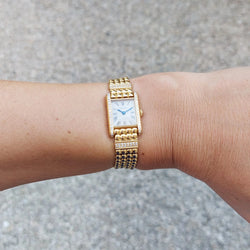 Montre CARTIER "Tank Louis Cartier Mini" en or jaune et diamants