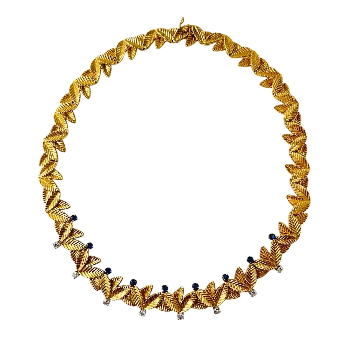 Collier Ras de Cou VAN CLEEF & ARPELS Feuilles en or jaune, saphirs et diamants