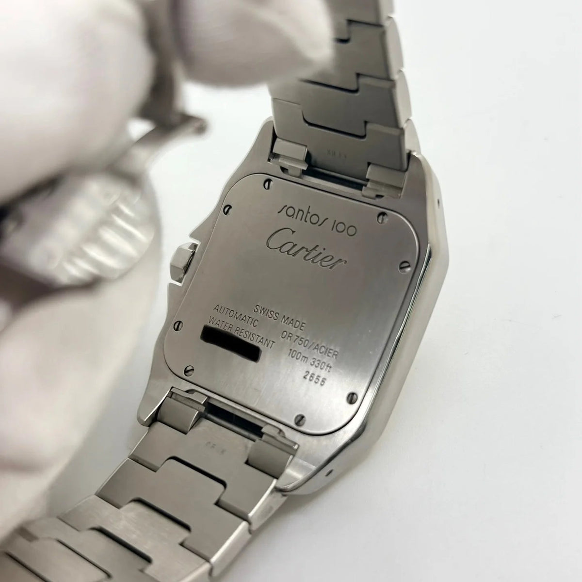 Montre CARTIER "Santos 100" en or jaune et acier inoxydable