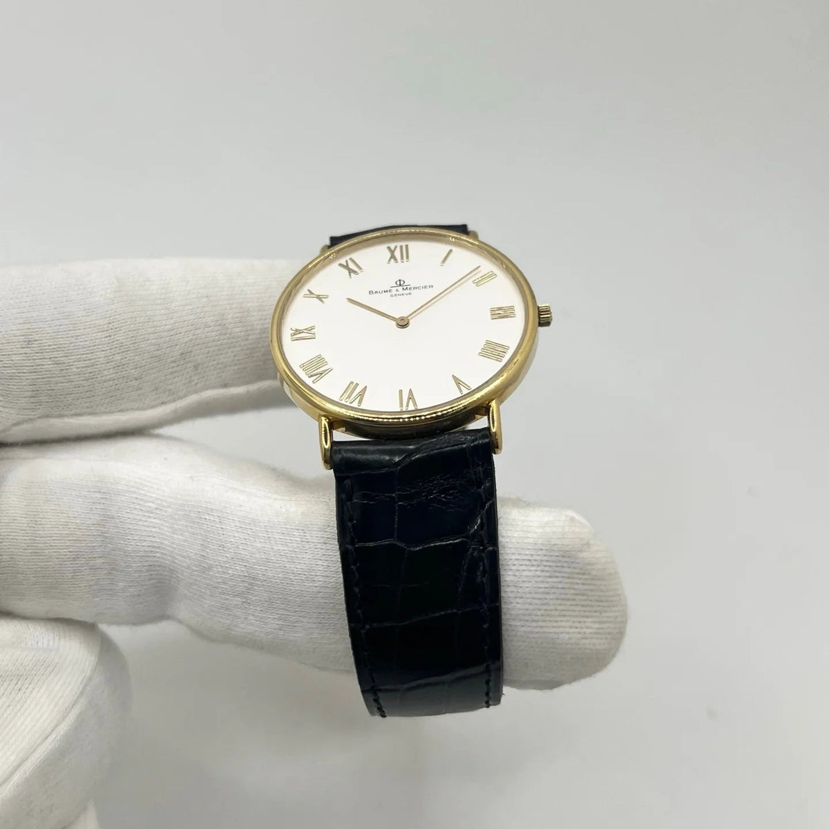 Montre BAUME & MERCIER "Classima" en or jaune, acier et cuir
