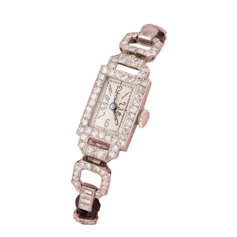 Montre en or blanc, platine et diamants