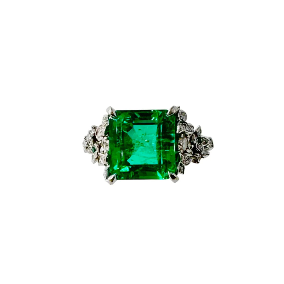 Bague Solitaire en or blanc, émeraude et diamants