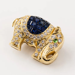 Broche "Elephant" en or jaune, diamants et saphirs
