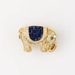 Broche "Elephant" en or jaune, diamants et saphirs