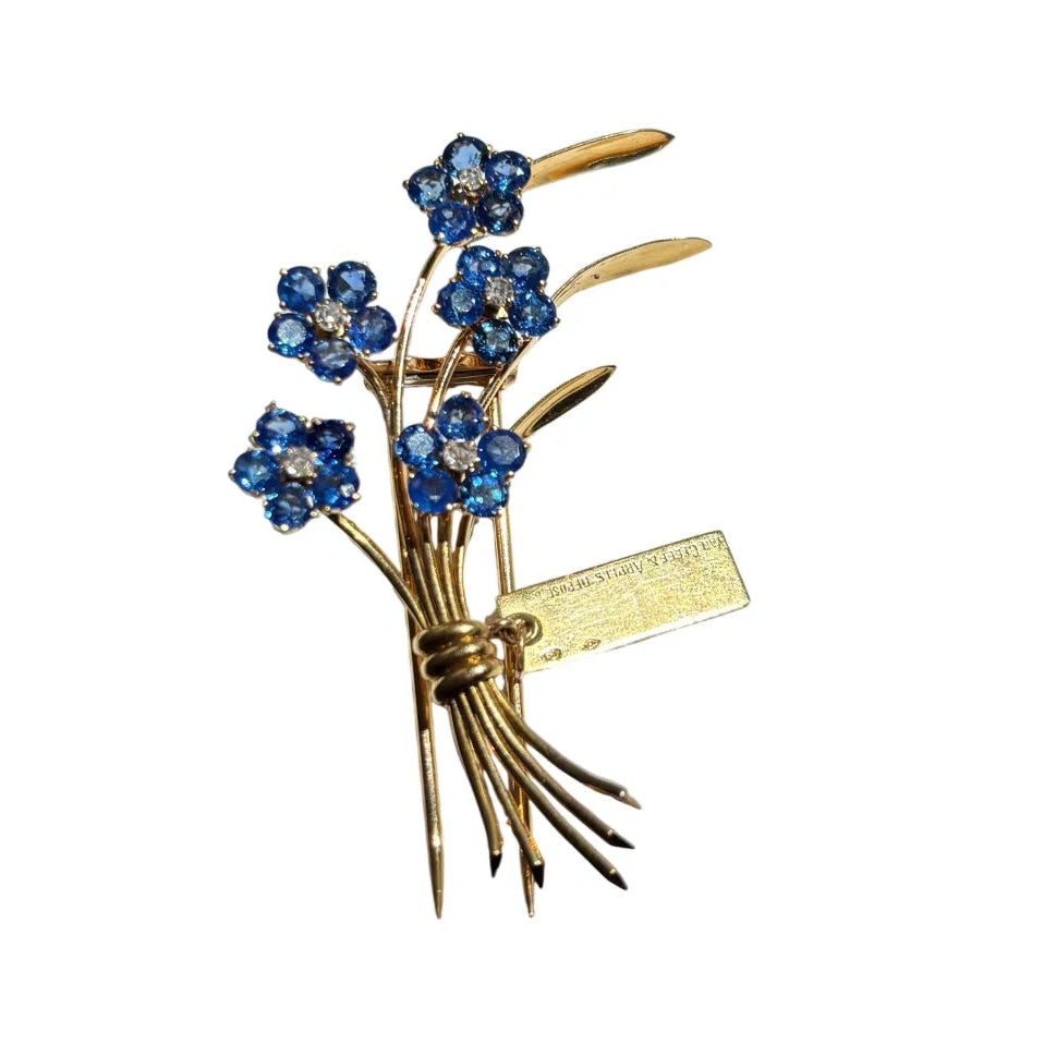 Broche Clip VAN CLEEF & ARPELS "Ne m'oubliez pas" en or jaune, saphirs et diamants
