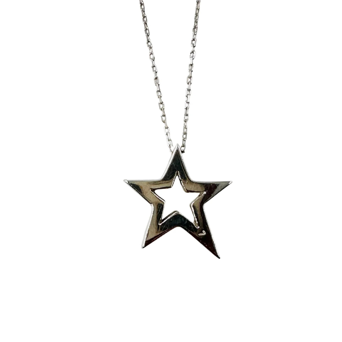 Collier Pendentif Étoile en or blanc et diamants