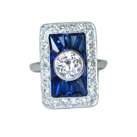 Bague Entourage en platine, saphirs et diamants