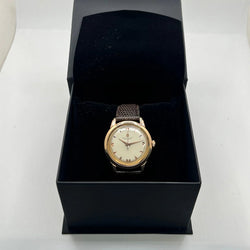 Montre BREITLING "Genève" plaqué or rose, acier et cuir